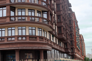 A fragment of the facade of the new unfinished homes.