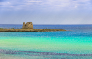 Sea colors. Apulia coast (Italy): Marina di Lizzano beach,Torre Sgarrata watchtower.It's characterized by a alternation of sandy coves and jagged cliffs overlooking a truly clear and crystalline sea.
