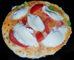 Omelet with Mozzarella nd tomatos