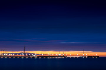 Sopot pier at cloudy night. Side view. Sopot, Poland.