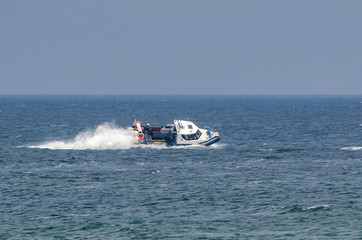 PATROL BOAT - Police boat in patrol action at sea