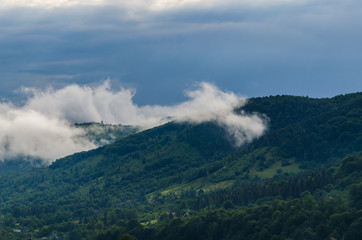 Ukrainian carpathian mountaine landscape with fog