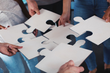 Team of businessmen work together for one goal. Concept of unity and partnership