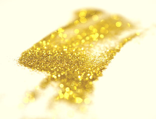 Textured background with golden glitter. Photographic filters were used, nostalgic colors