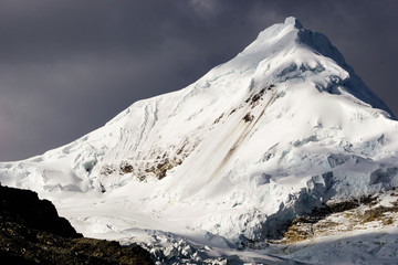 north face of the well-known peak Nevado Tocllaraju in the Andes in Peru in the Cordillera Blanca