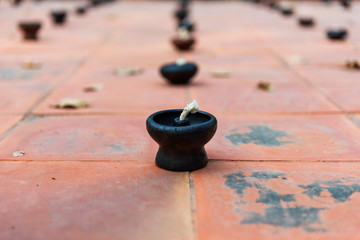 Oil lamps the creation using a point in Buddhism in Thailand.