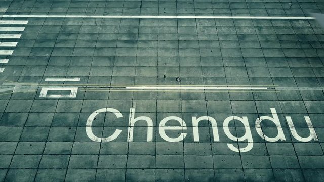 Aerial view of big airplane arriving to Chengdu airport. Travel to China conceptual intro animation