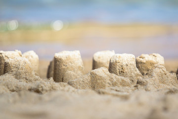 A sandcastle on a sandy beach