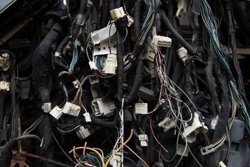 Old electric cables in junkyard