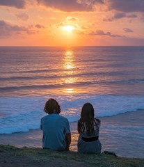 Portrait of a romantic young couple in love,woman and male sitting on the ground, lifestyle concept