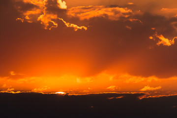 colorful dramatic sky with cloud at sunset