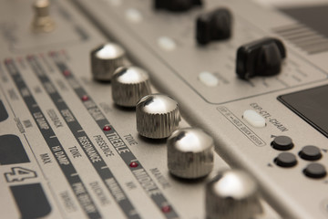 Details of Guitar Music Recording Equipment with Chrome Knobs