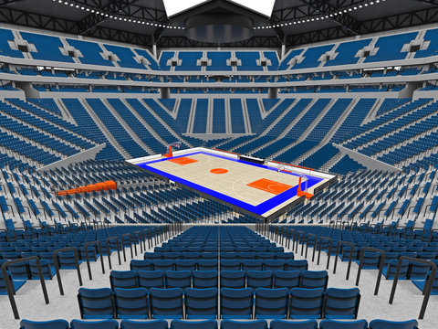 Large modern basketball arena with blue seats