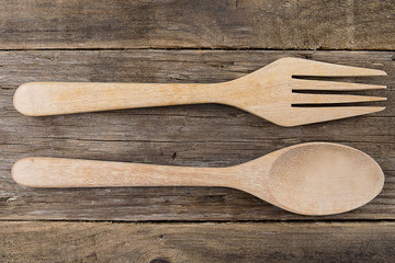 Wooden utensil kitchen on wooden table background