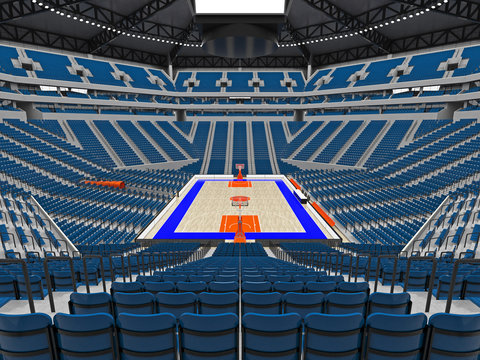 Large modern basketball arena with blue seats