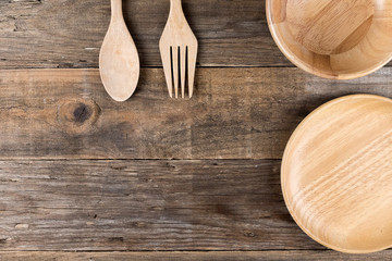 Wooden utensil kitchen on wooden table background