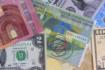 Abstract dollar euro and swiss franc background.