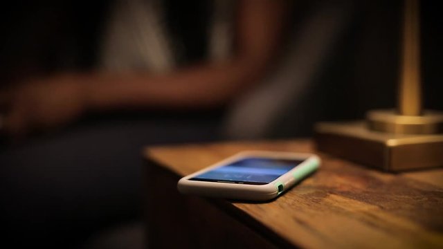 Picking up Smartphone