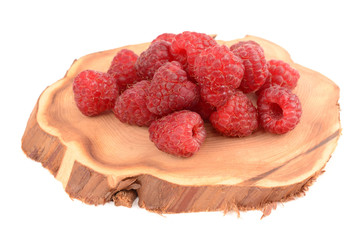 Raspberries on a white background