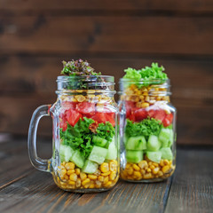 Vegetable salad for a picnic in glass jars. Healthy food, Diet, Detox, Clean Eating or Vegetarian concept