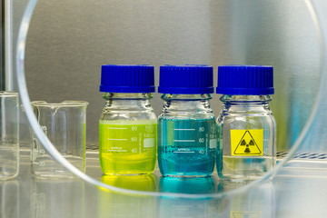 glas bottles in a laboratoy environment radioactive material