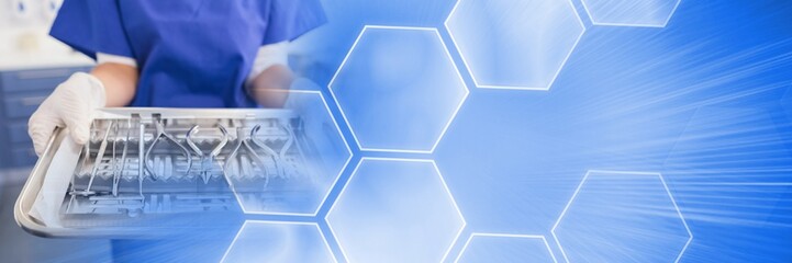 Close up of dentist with trays and blue smart tech transition