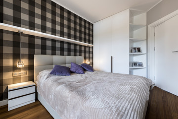 Fototapeta na wymiar Modern bedroom with checker pattern