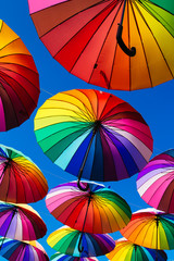 Colored umbrellas hung above the street.