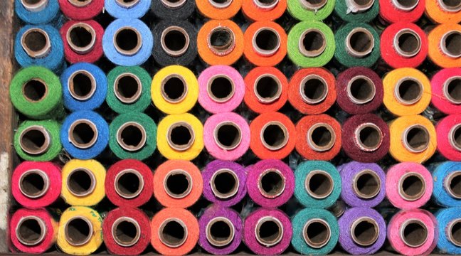 sewing cotton thread haberdashery cotton spools many rainbow colors shop display stock, photo, photograph, image, picture, 