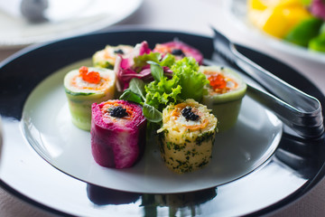 Decorated catering banquet table with different food appetizers assortment on a party
