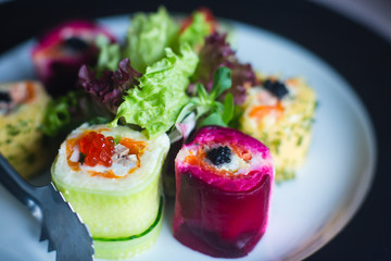 Decorated catering banquet table with different food appetizers assortment on a party
