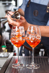 Barman at work, preparing cocktails. concept about service and beverages