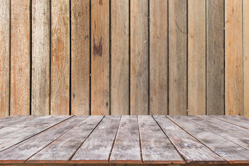 Wooden table on wooden wall