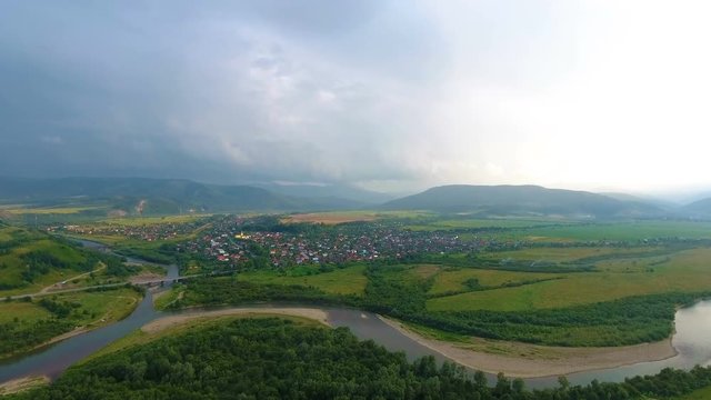 Village near river. verkhnye syn`ovydne. Ukraine gloomy weather