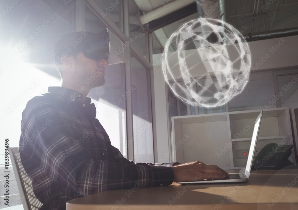 Poster man in vr headset looking at a 3d sphere interface
