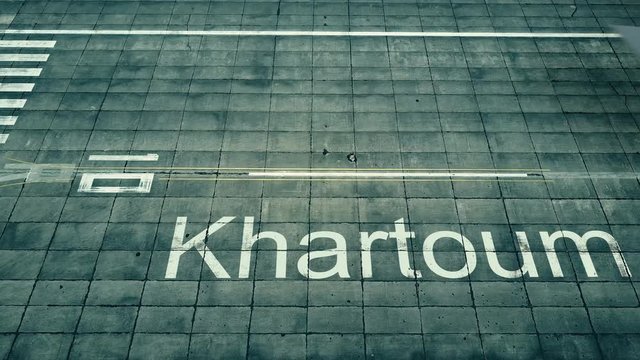 Aerial view of big airplane arriving to Khartoum airport. Travel to Sudan conceptual intro animation
