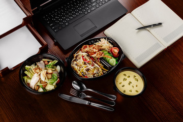 Business lunch on the desktop of your computer