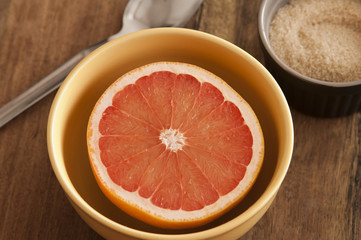 Cut fresh pink grapefruit served for breakfast