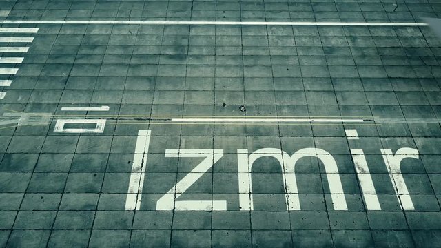 Aerial view of big airplane arriving to Izmir airport. Travel to Turkey conceptual intro animation