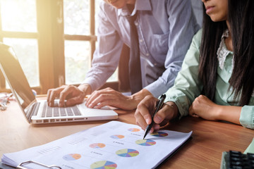 Business team analyzing income