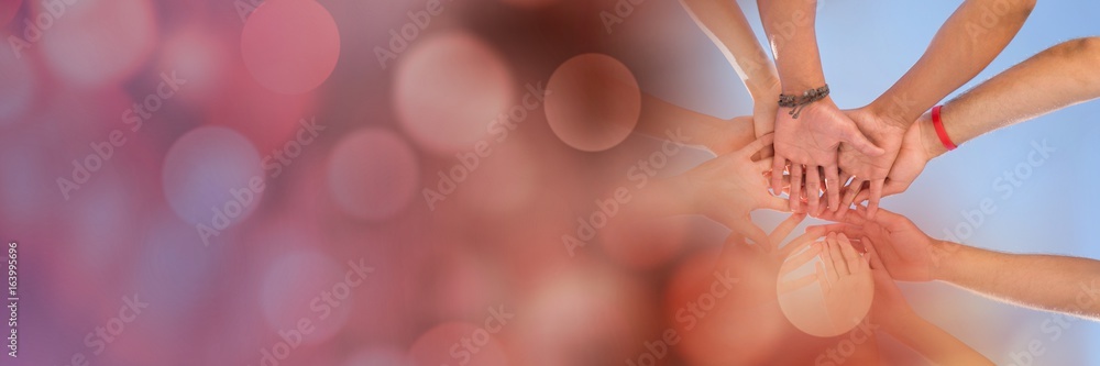 Poster low angle of hands together and red bokeh transition