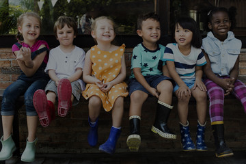 Group of kindergarten kids little farmers learning gardening