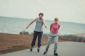 Teens together on skating date.