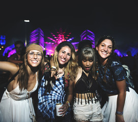 Group of Friends Drinking Beers Enjoying Music Festival together