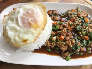 rice topped with stir-fried pork and basil.