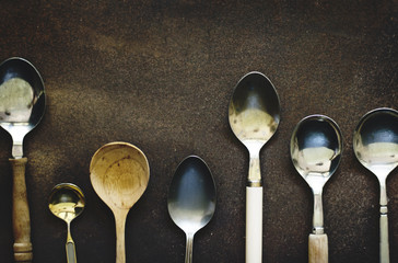 Different kind of spoon isolated on background