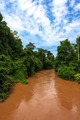 Muddy river after rain in the Khao Yai National Park in Thailand.