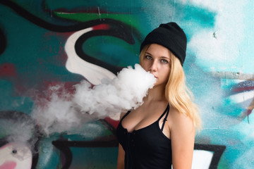 Young sexy blonde smoking