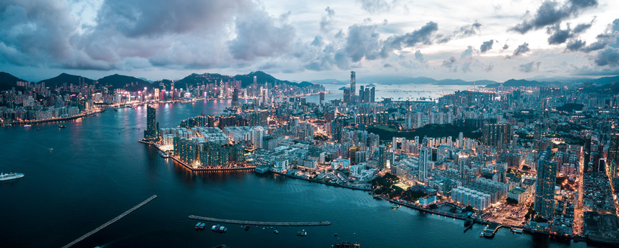 Fototapeta Aerial view of Hong Kong Island and Kowloon on sky