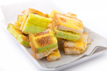 Toast the bread in dish isolate on white background